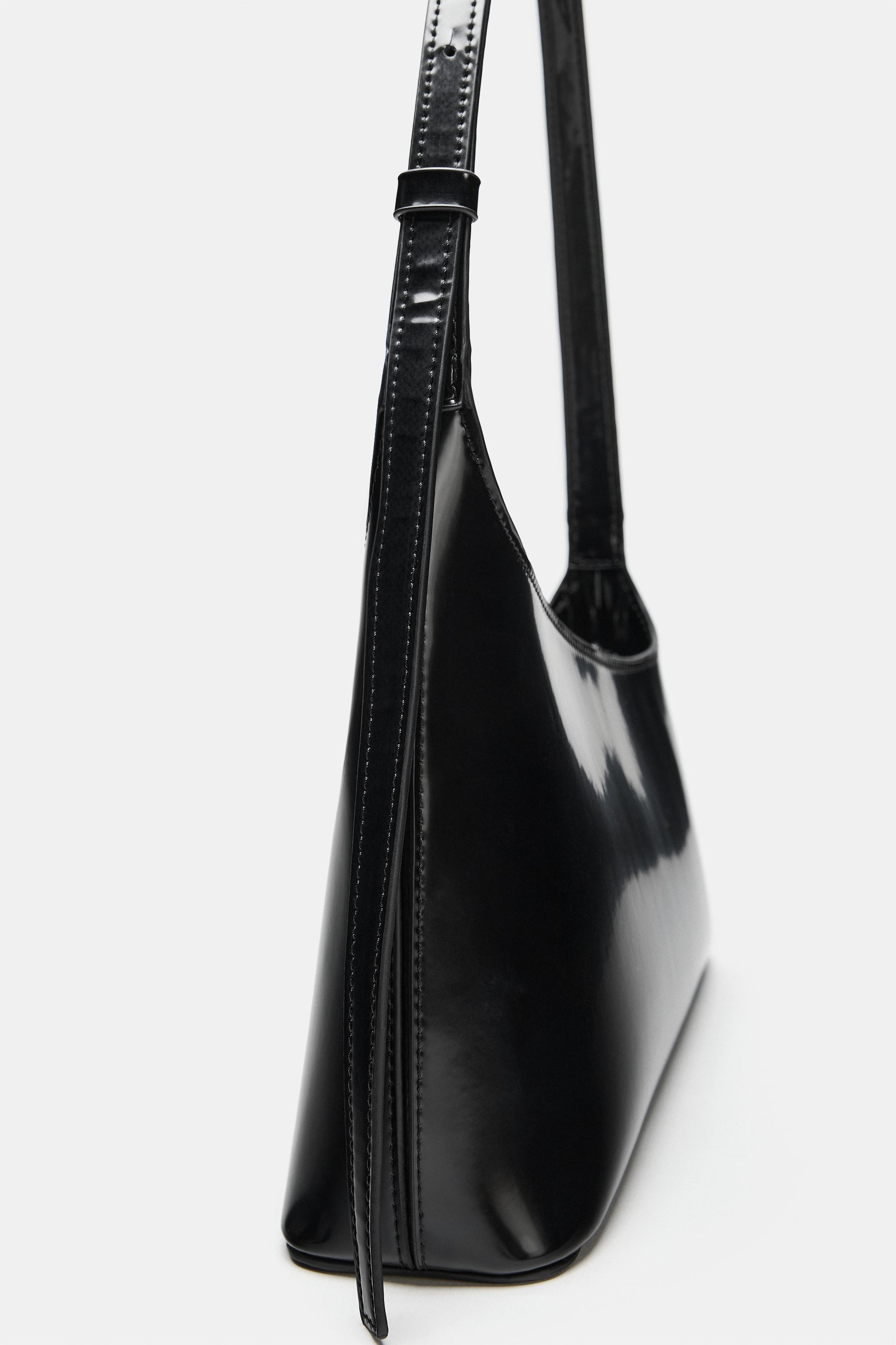 ASYMMETRIC SHOULDER BAG